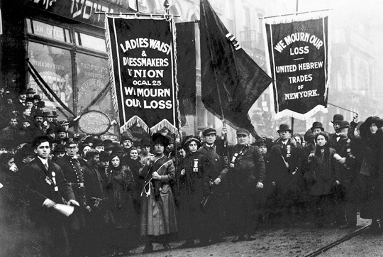 Women mourning the loss of fellow workers.